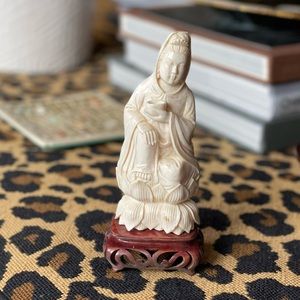 Bone carved Chinese figurine on wood base
